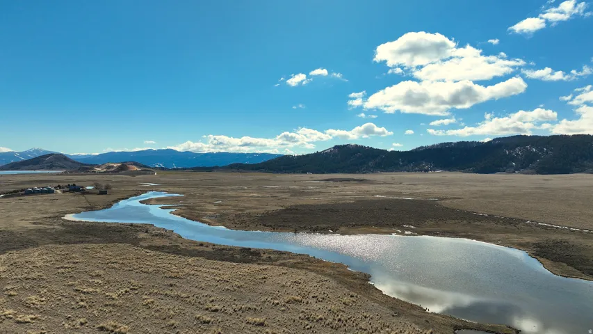 View of mountain background with a nearby body of water