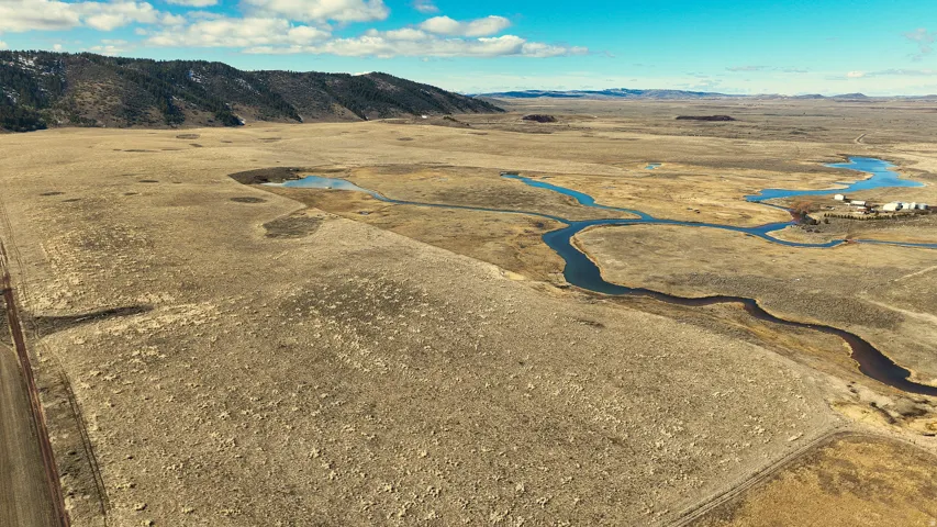 View of rural area with mountains and a desert landscape