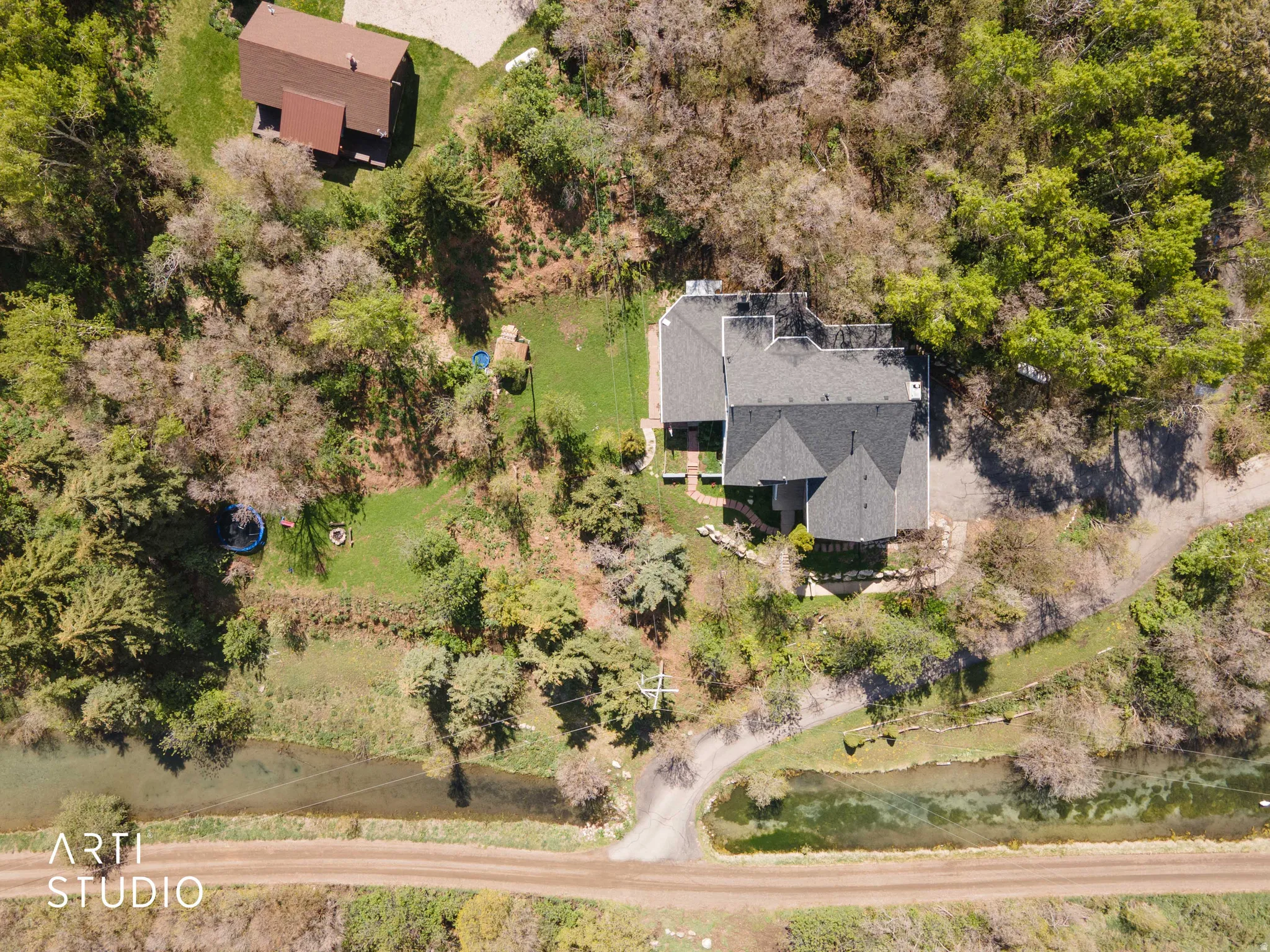 Drone / aerial view of a tree filled landscape