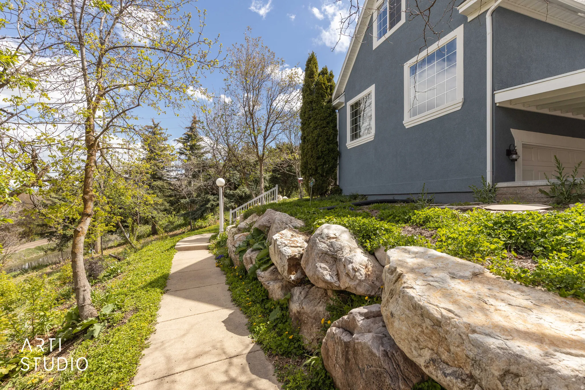 View of side of property with stucco siding