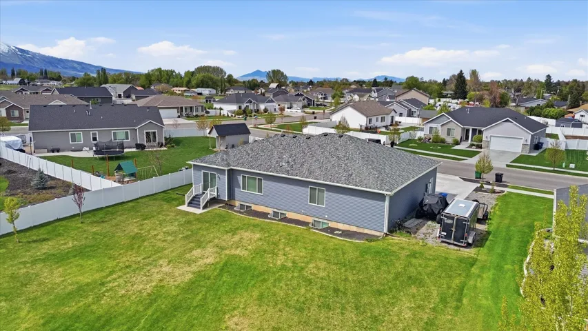 Aerial perspective of suburban area with mountains