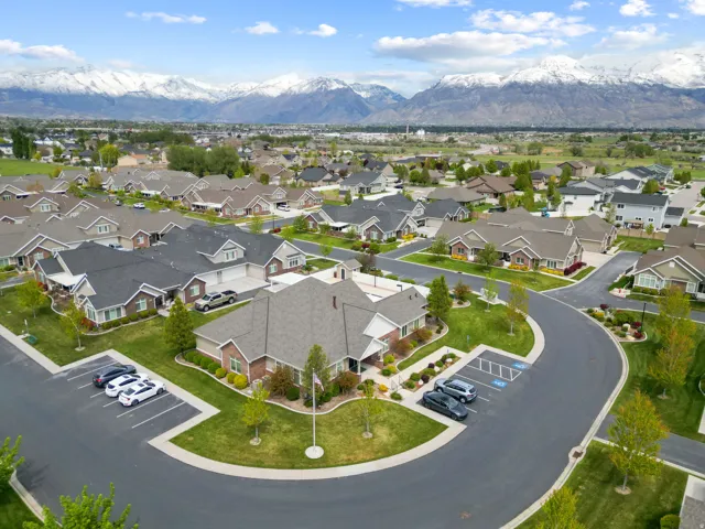 Aerial view of residential area featuring a mountain backdrop
