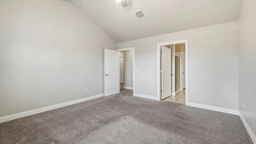 Master with doors to the closet and bathroom