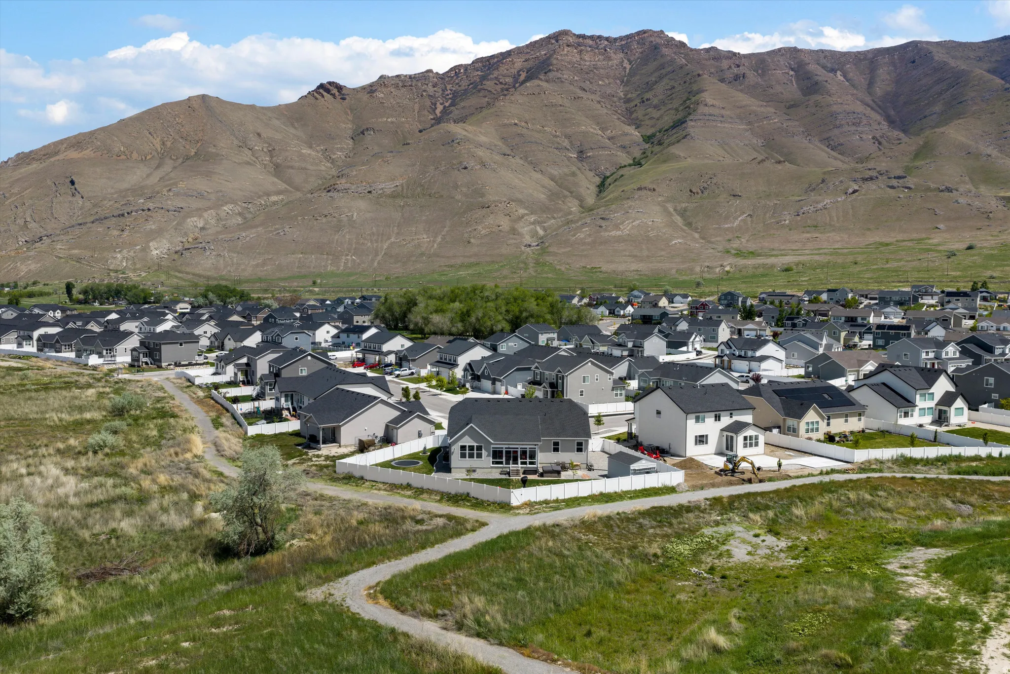 Aerial view of residential area with mountains
