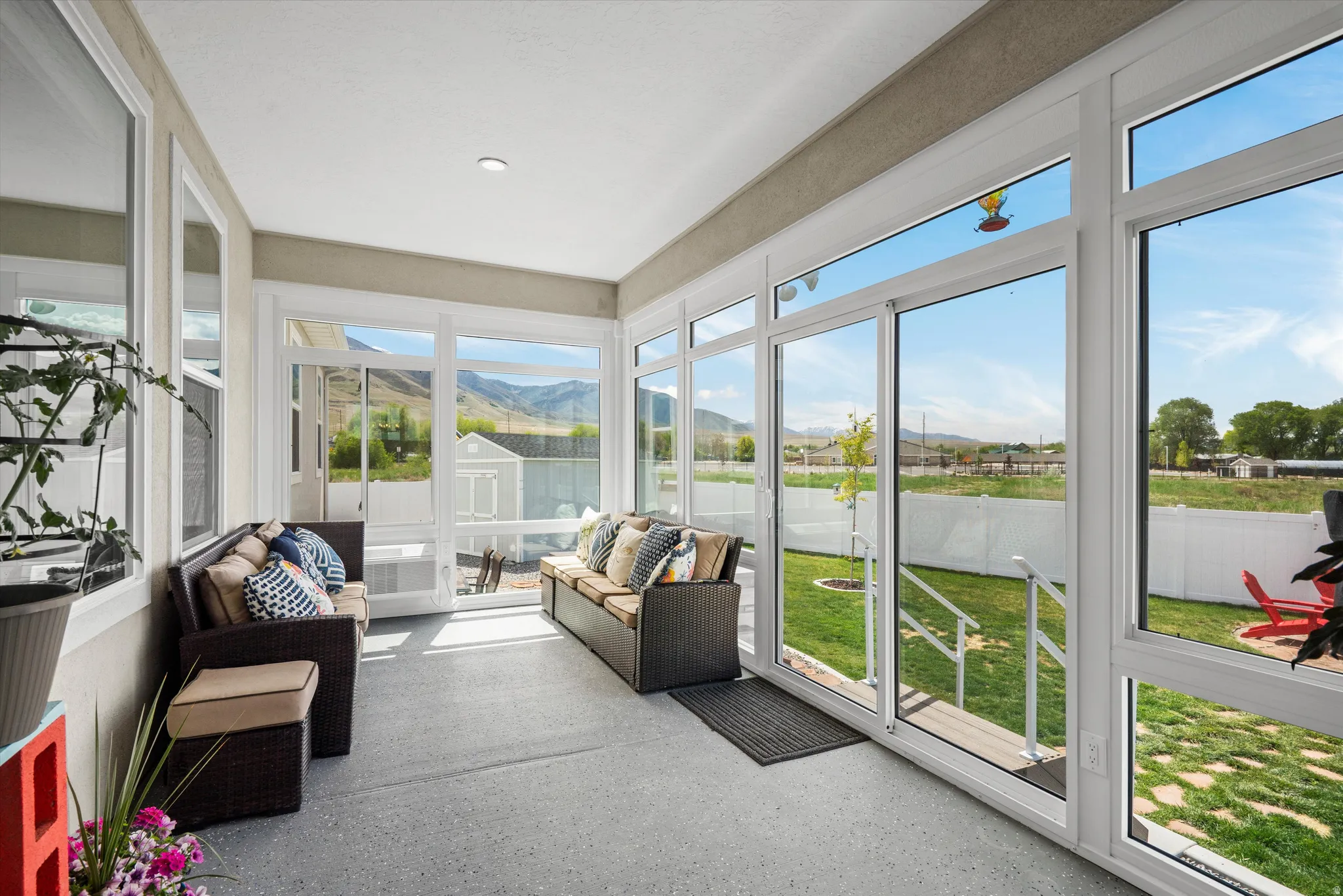 Sunroom / solarium with a mountain view