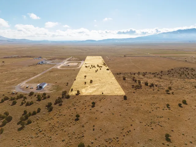 Overview of rural Cedar Valley landscape with mountains and a desert landscape