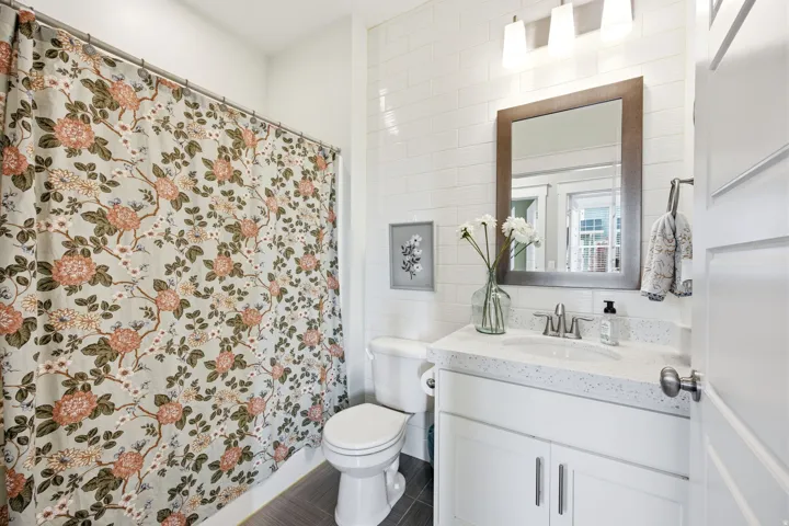 Full bath featuring vanity and a shower with curtain