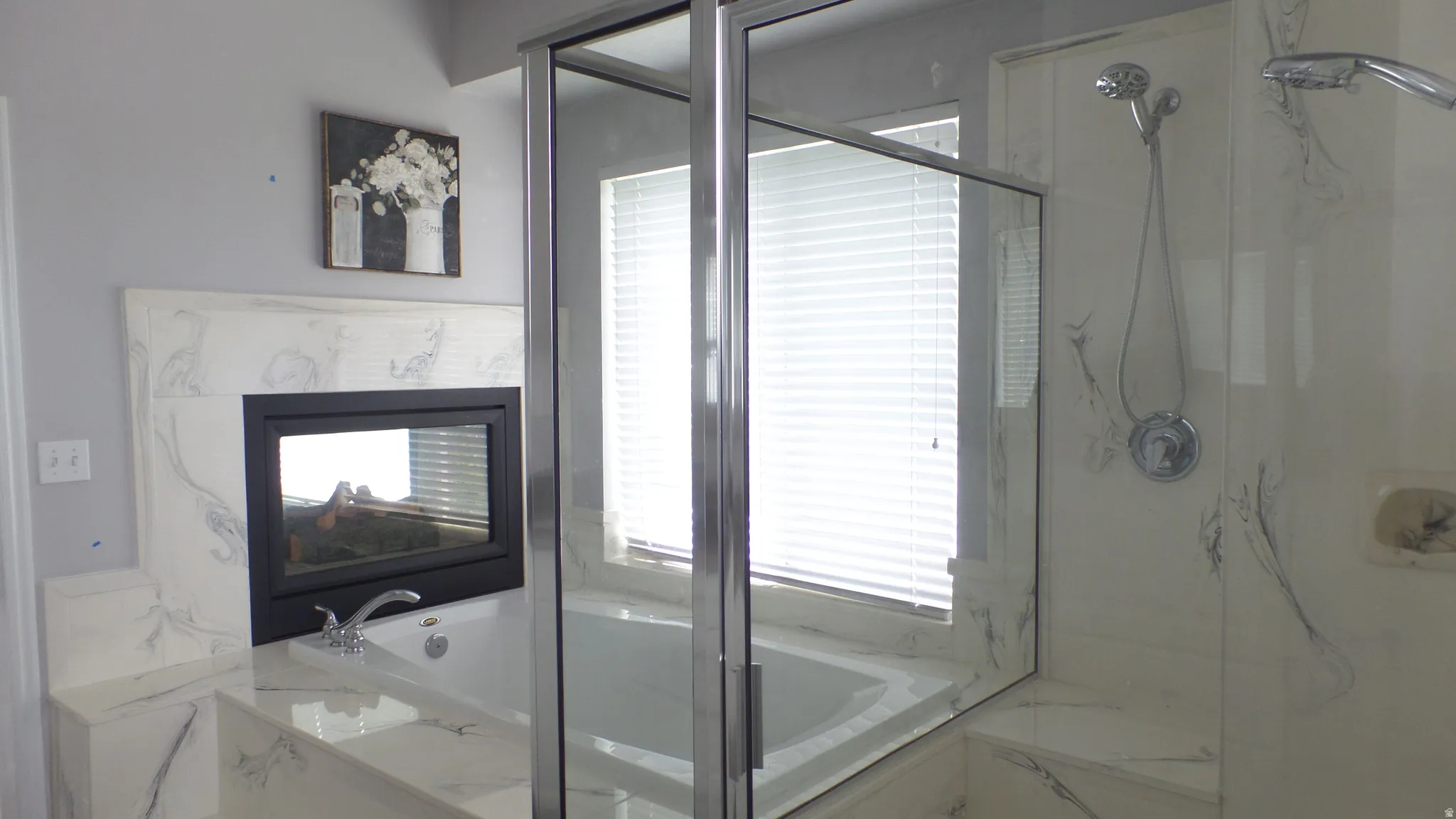 Owners Ensuite - Separate Shower & Soaking Tub with 2-Way Fireplace