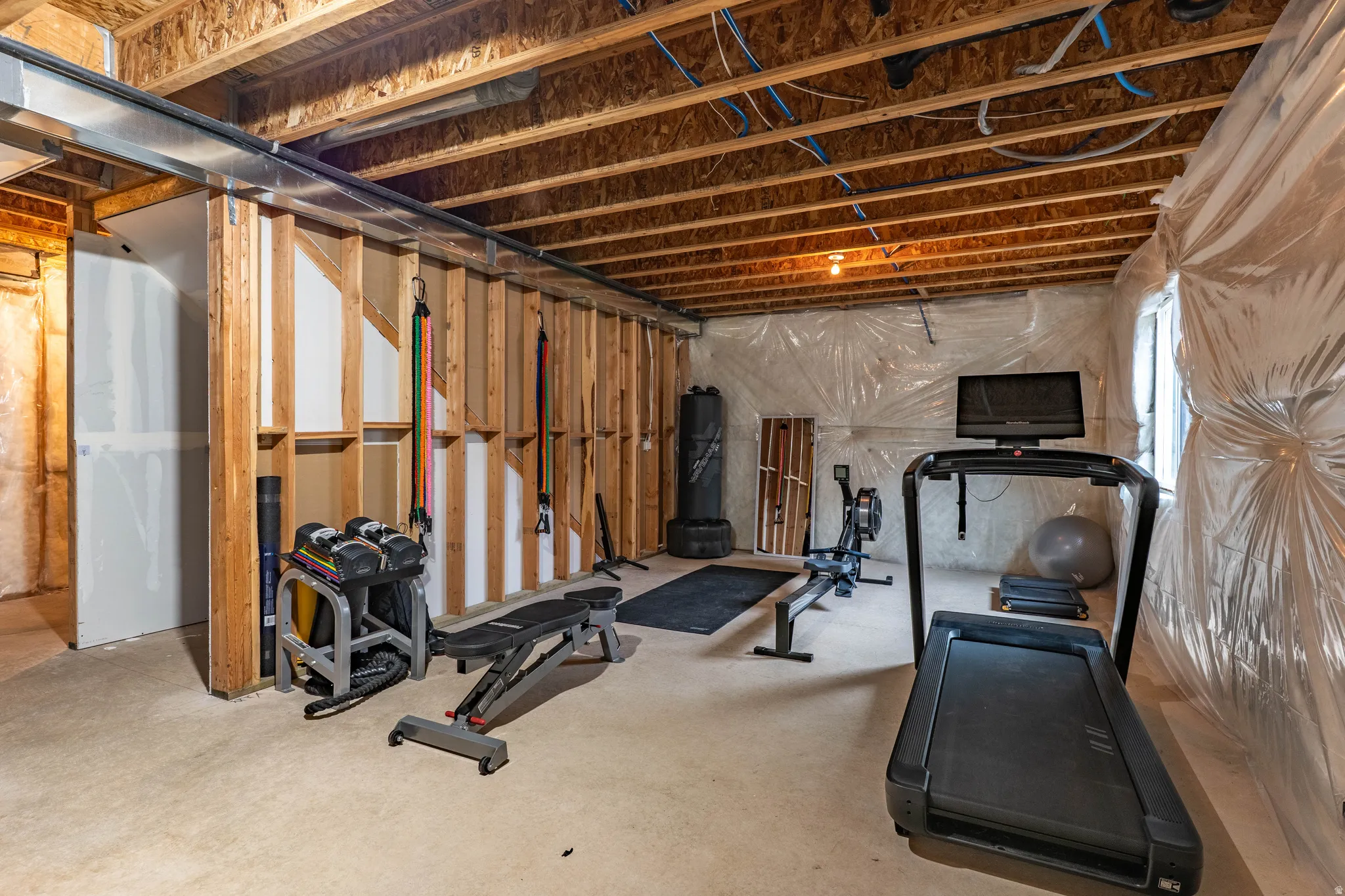 Workout area with concrete flooring