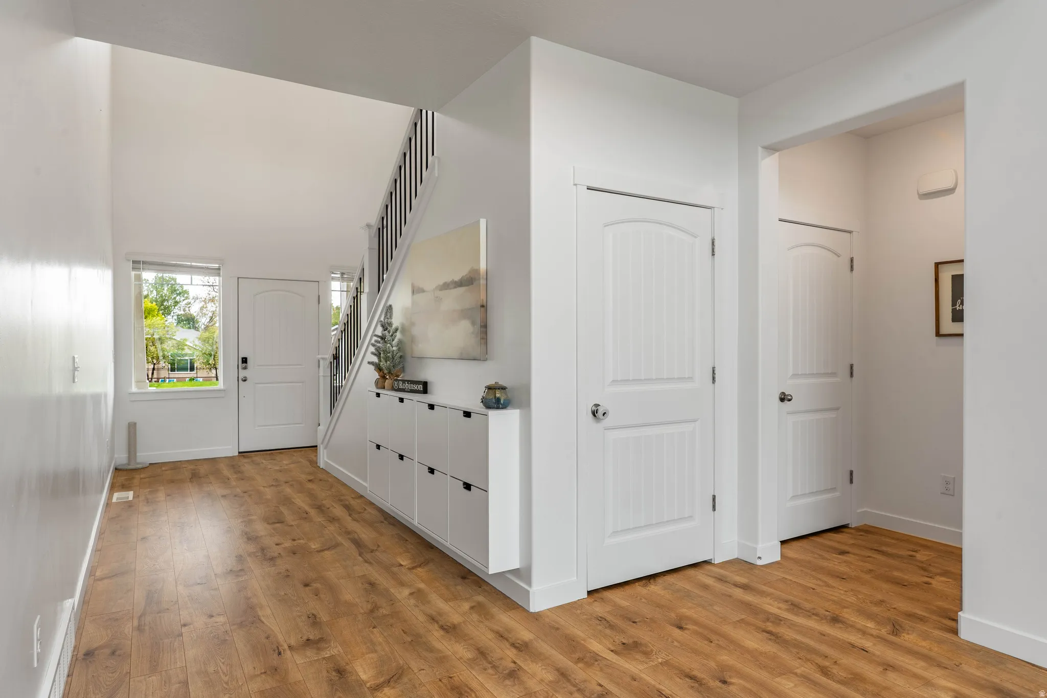 Foyer entrance featuring light wood-style flooring