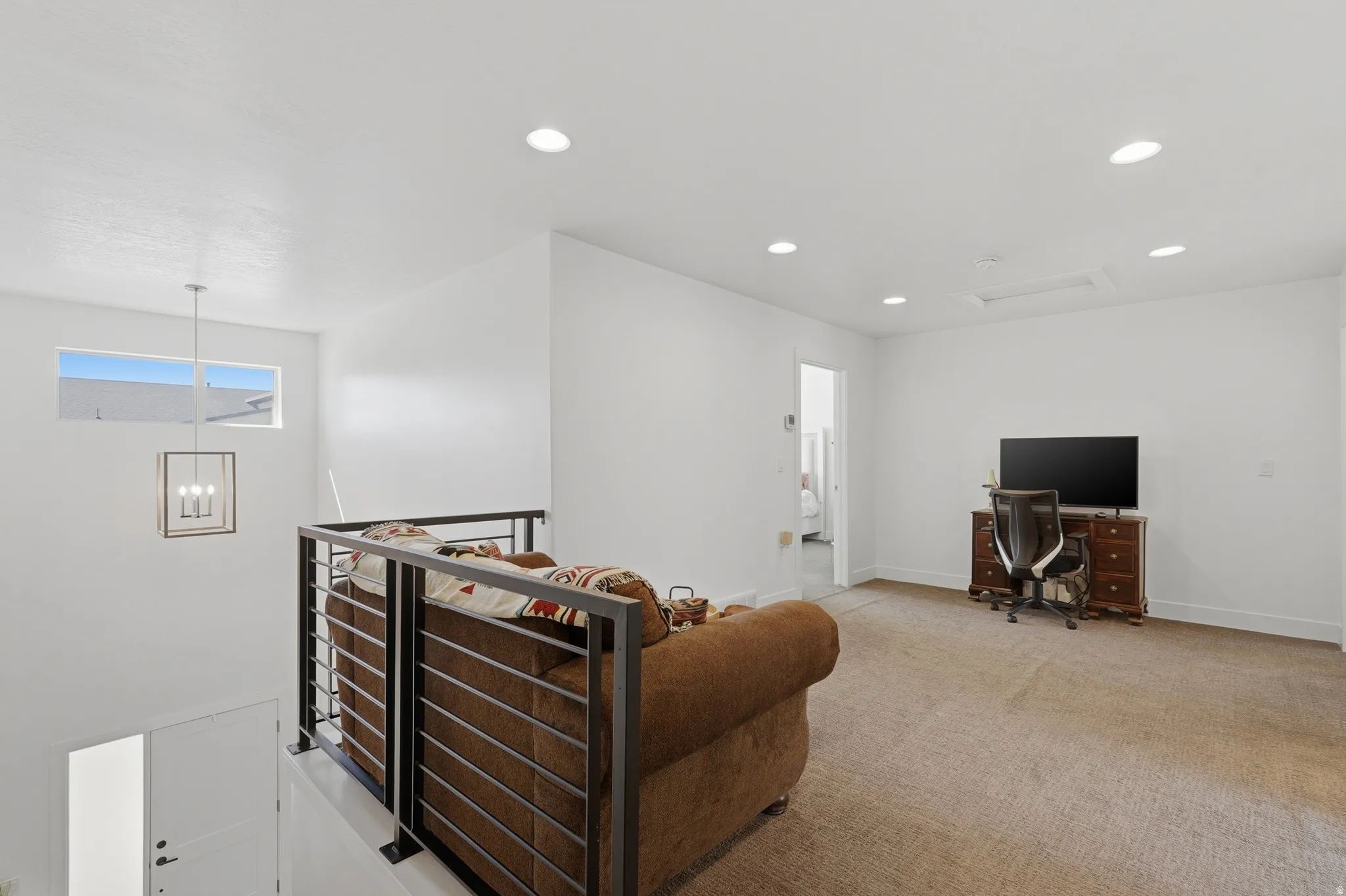 Large loft area could be used as a family room, and office, or other flex space