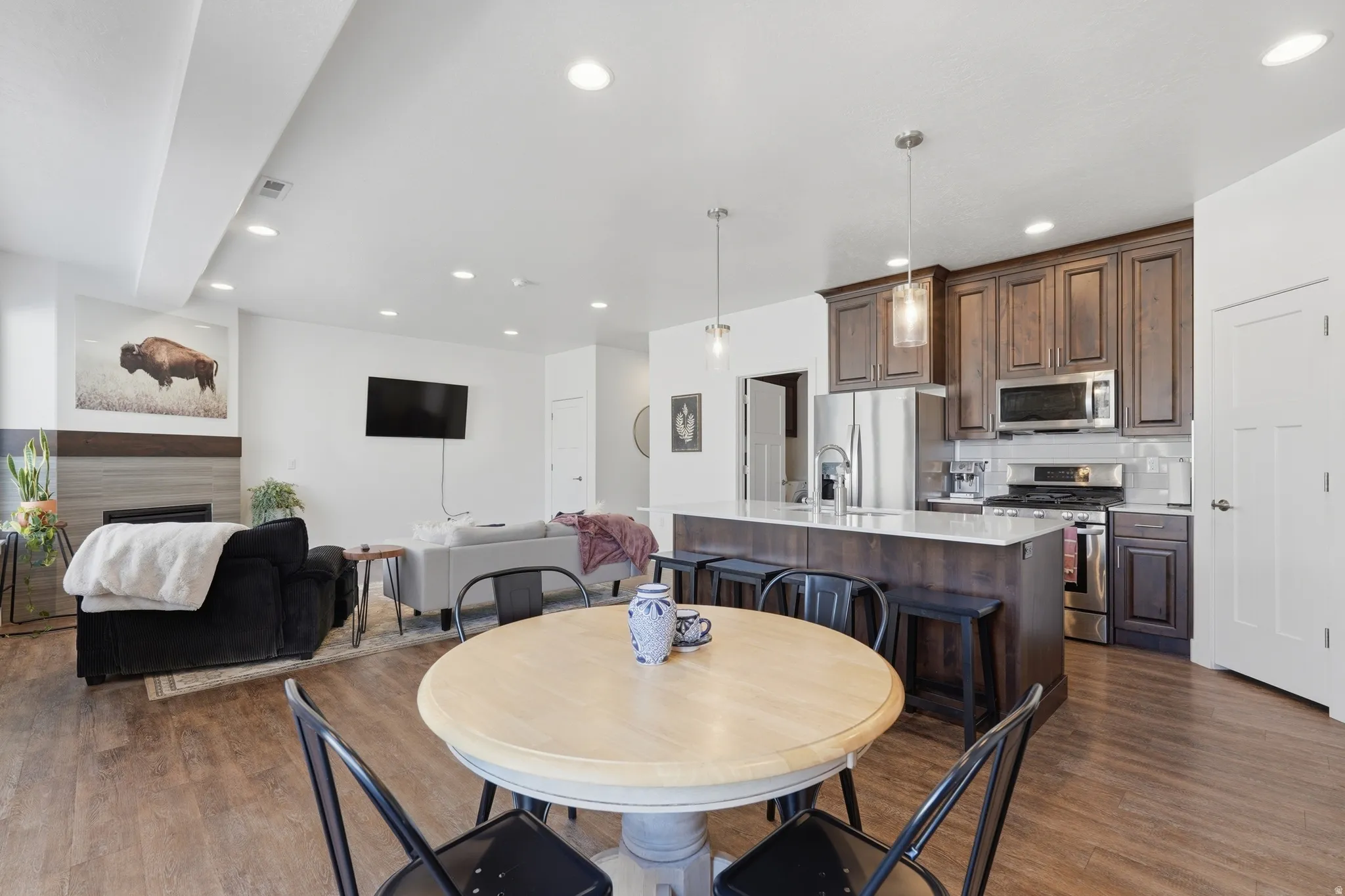 Dining area looking toward kitchen and living space. Open enough for large gatherings, but just right for intimate evenings