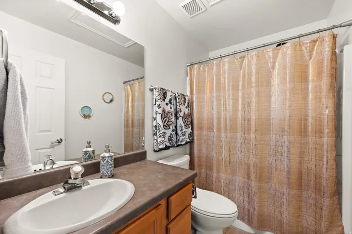 Bathroom with vanity and toilet