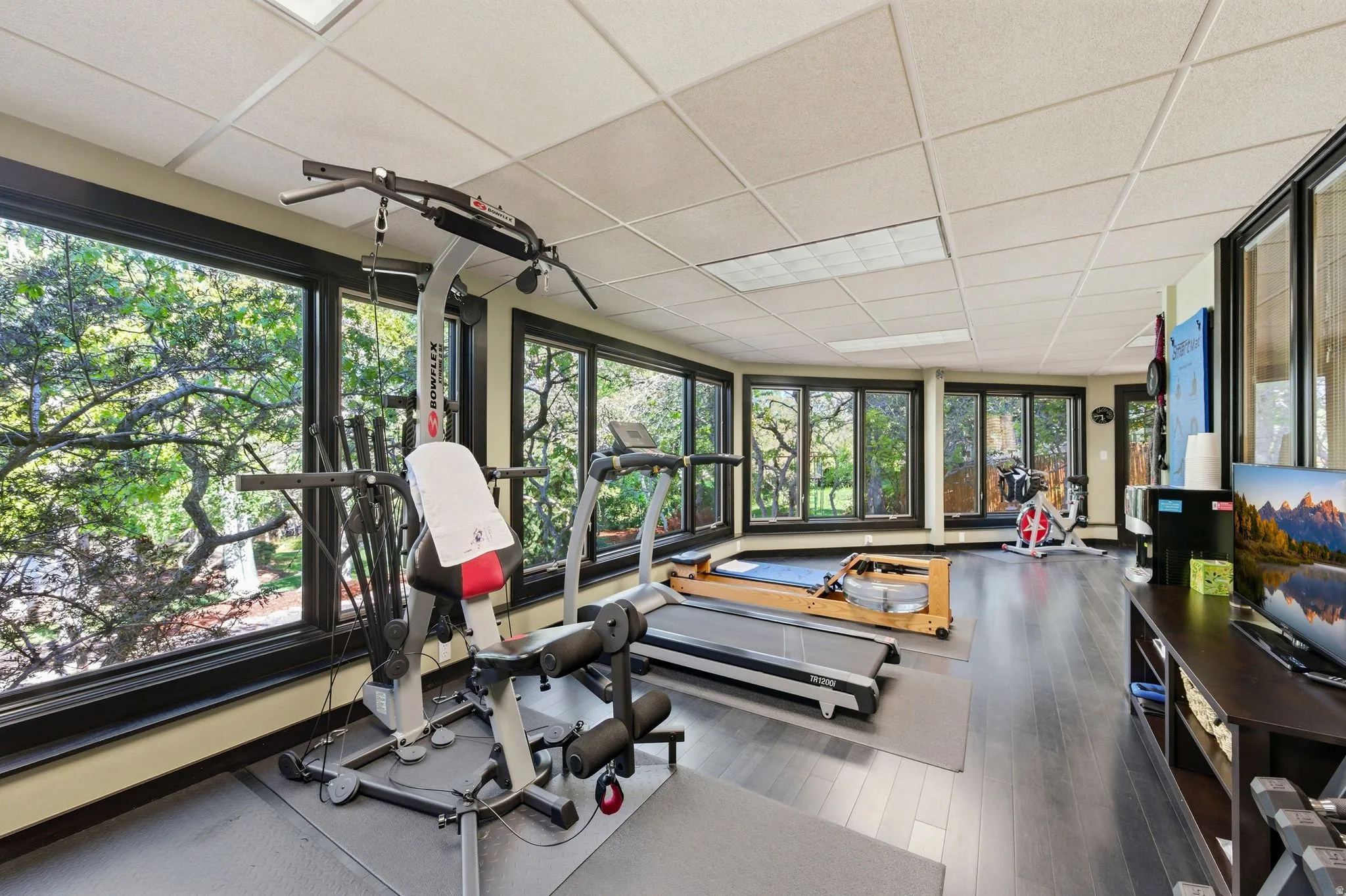 Exercise room featuring a drop ceiling