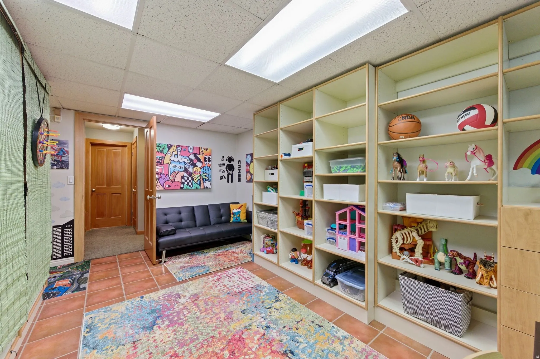 Game room featuring a paneled ceiling
