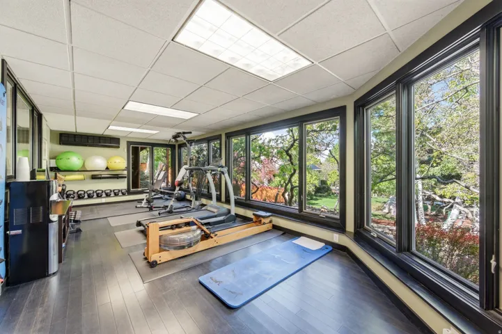 Workout area with a paneled ceiling