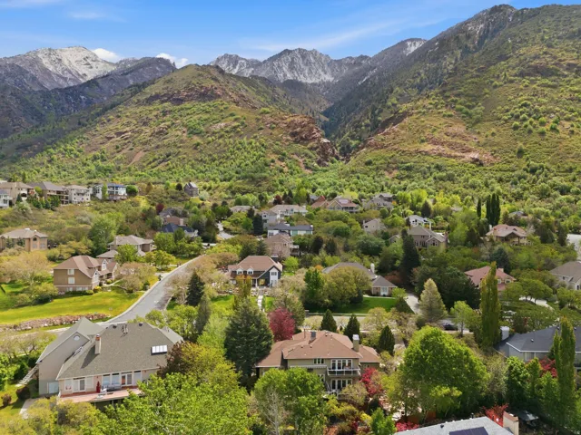 Aerial view of residential area with mountains