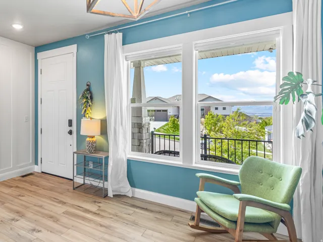 Entryway with a chandelier and light wood-type flooring