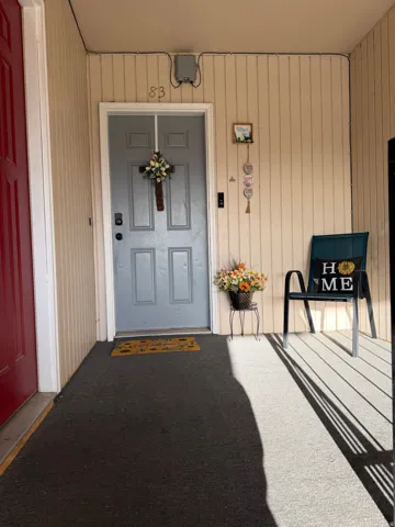 Doorway to property with a porch