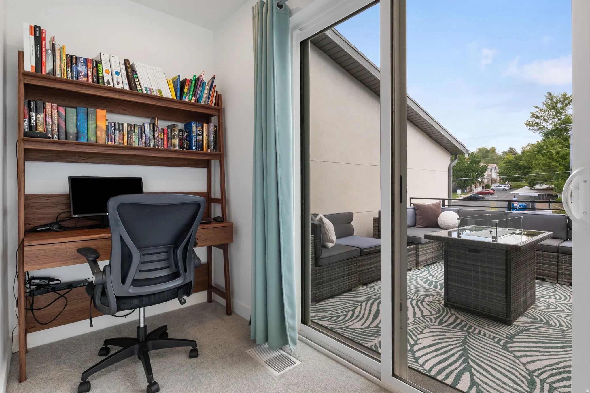Home office with light carpet