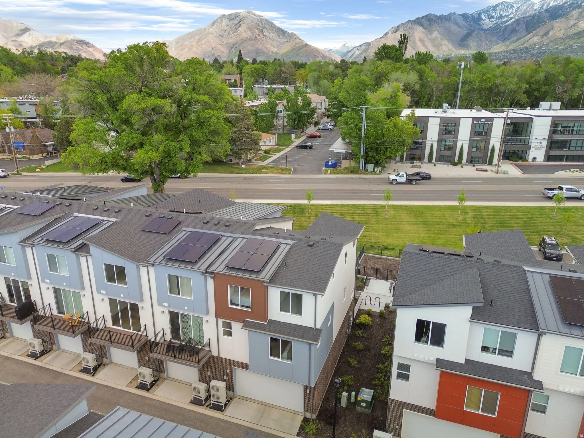 Aerial view of residential area with a mountainous background