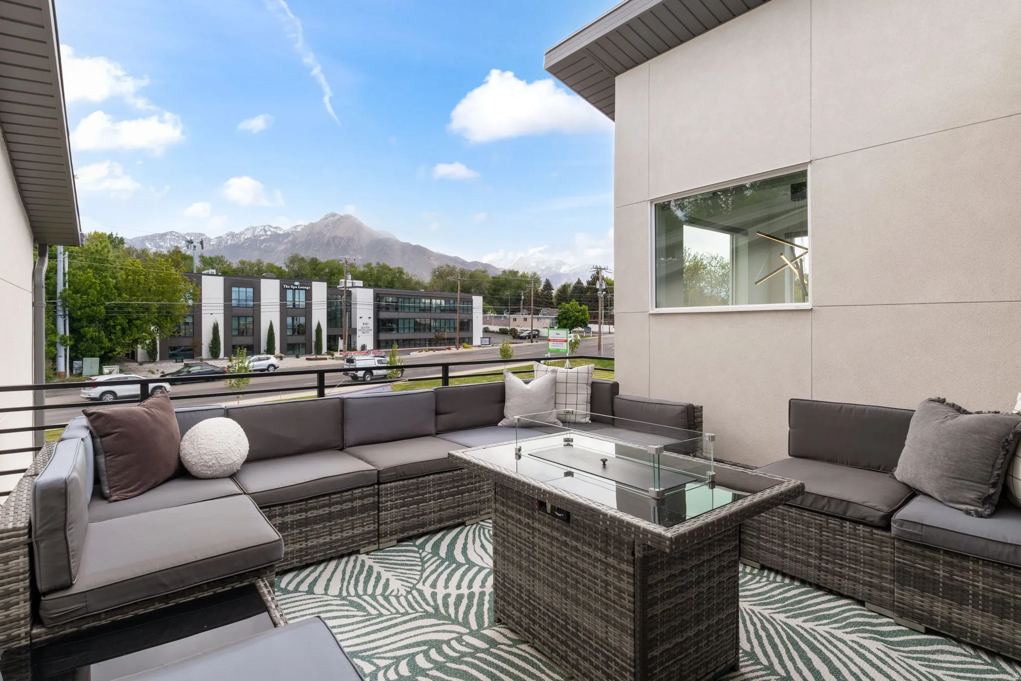 View of patio / terrace featuring outdoor seating and a mountain view
