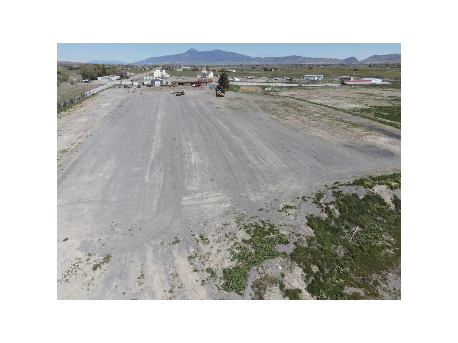 View of dirt / gravel road featuring a mountain view