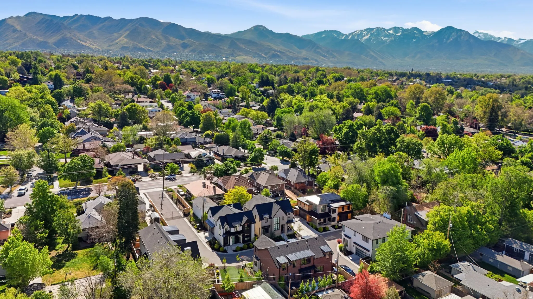 Aerial view of residential area with mountains