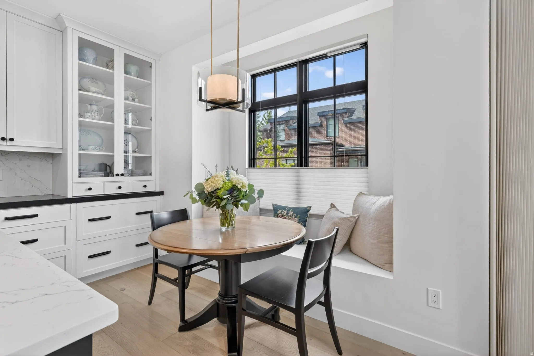 Dining space with breakfast area and light wood-type flooring