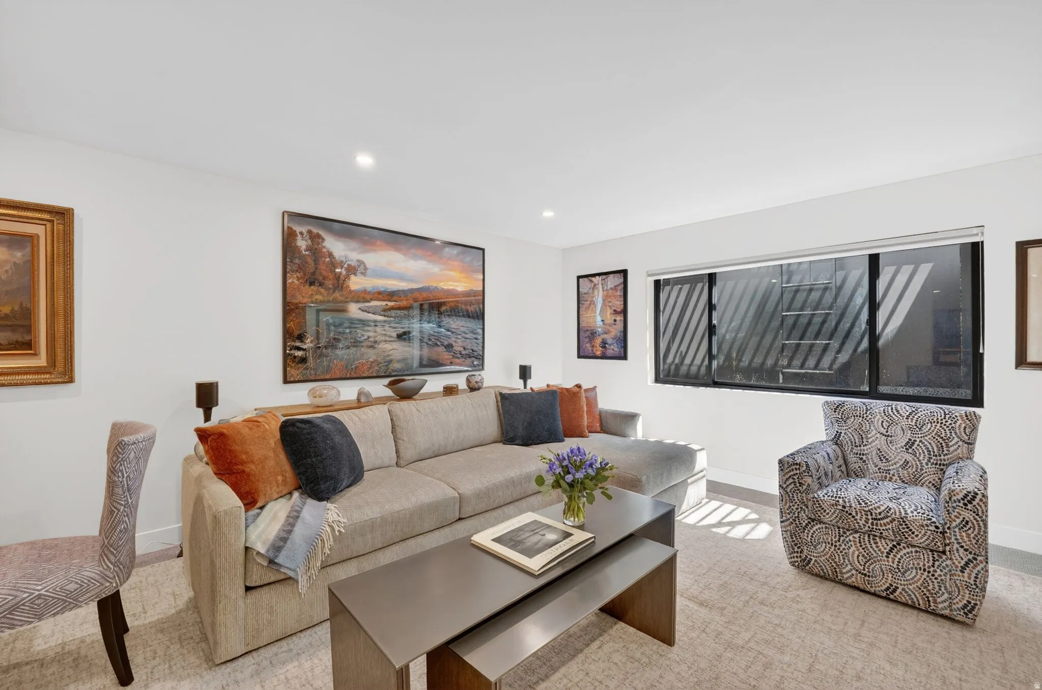 Living room with recessed lighting and carpet