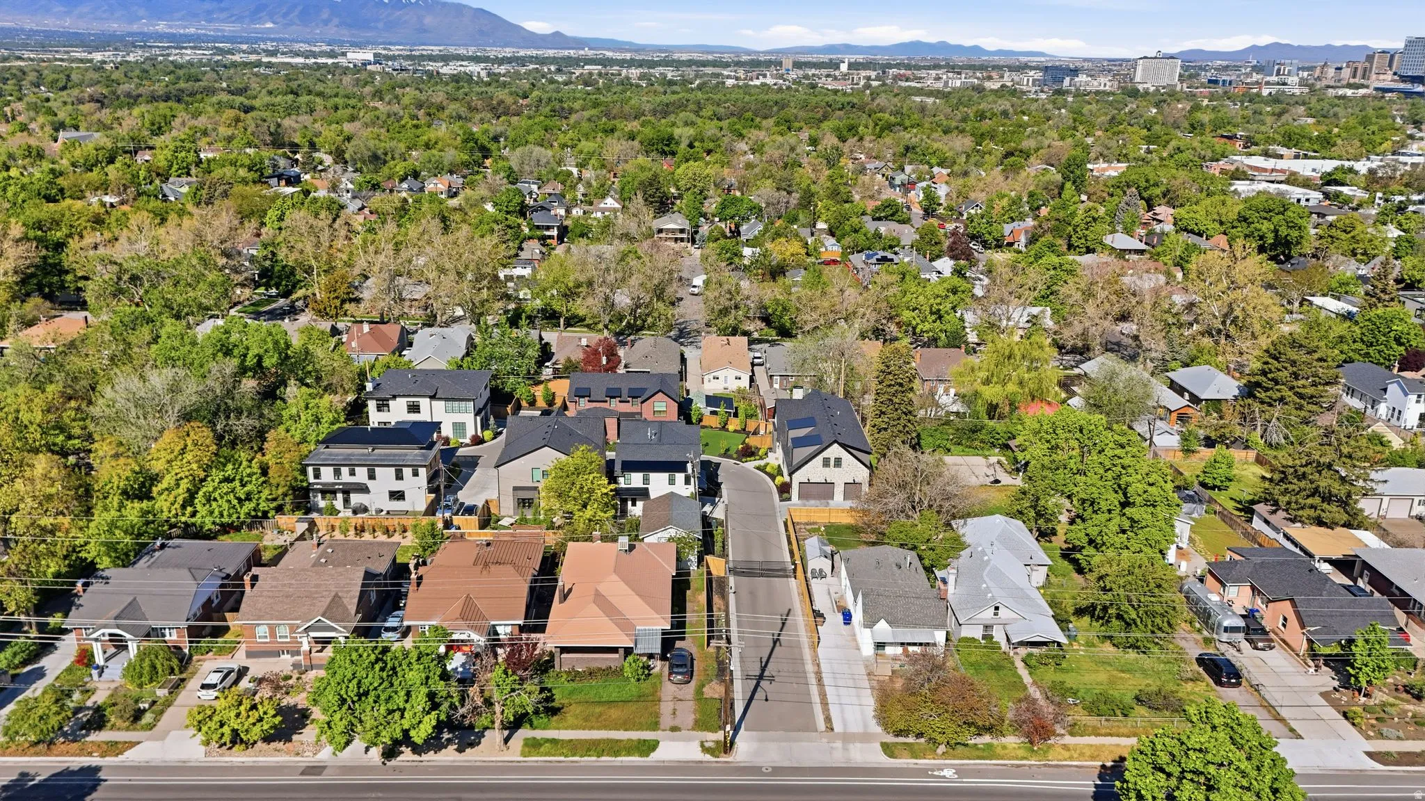 Aerial view of residential area with a mountain backdrop