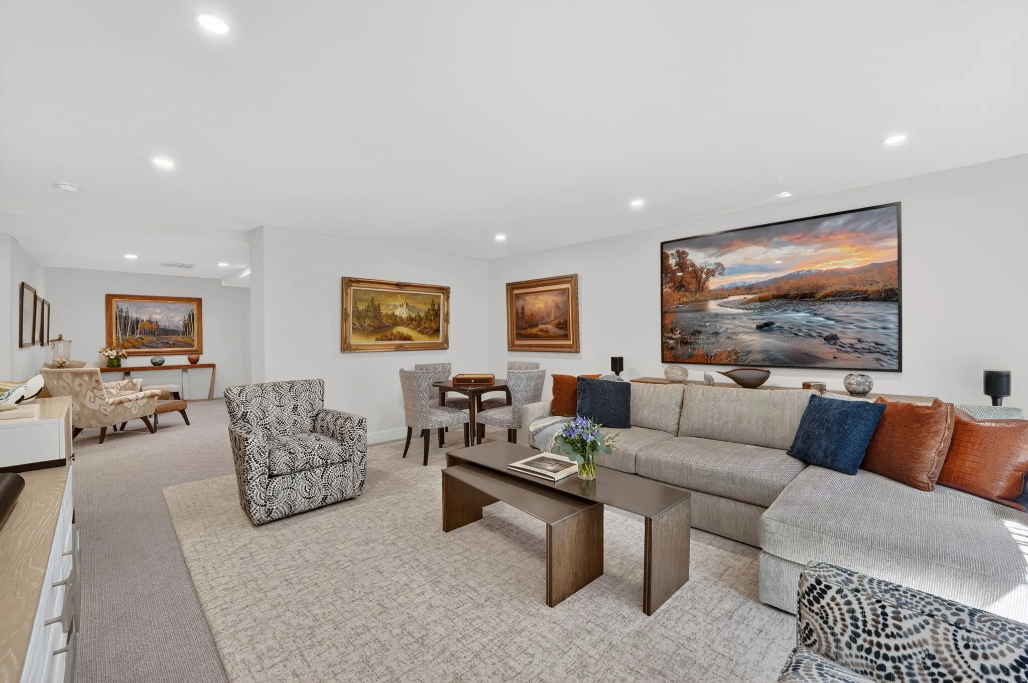 Carpeted living room featuring recessed lighting