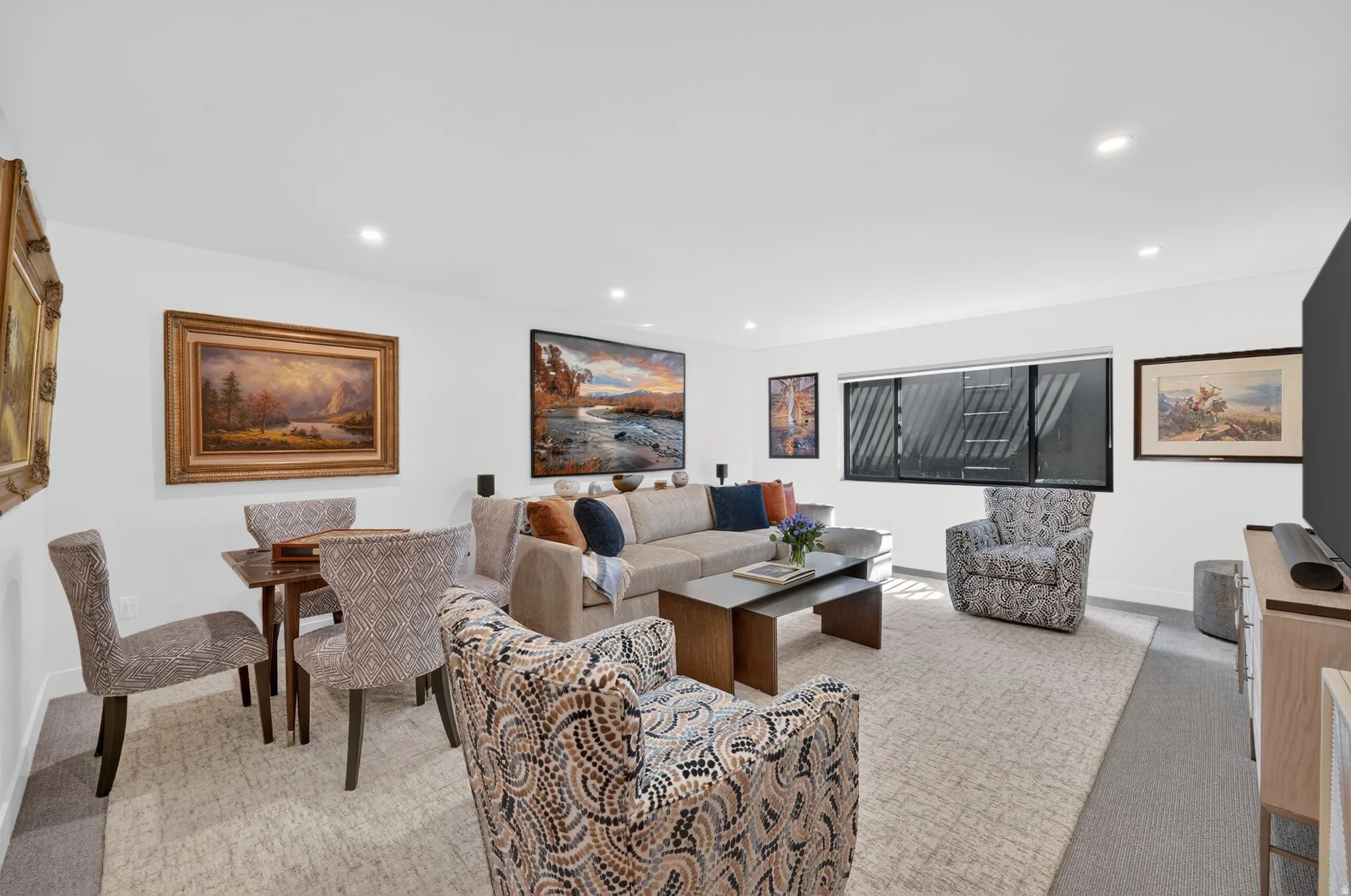 Living room featuring light carpet and recessed lighting