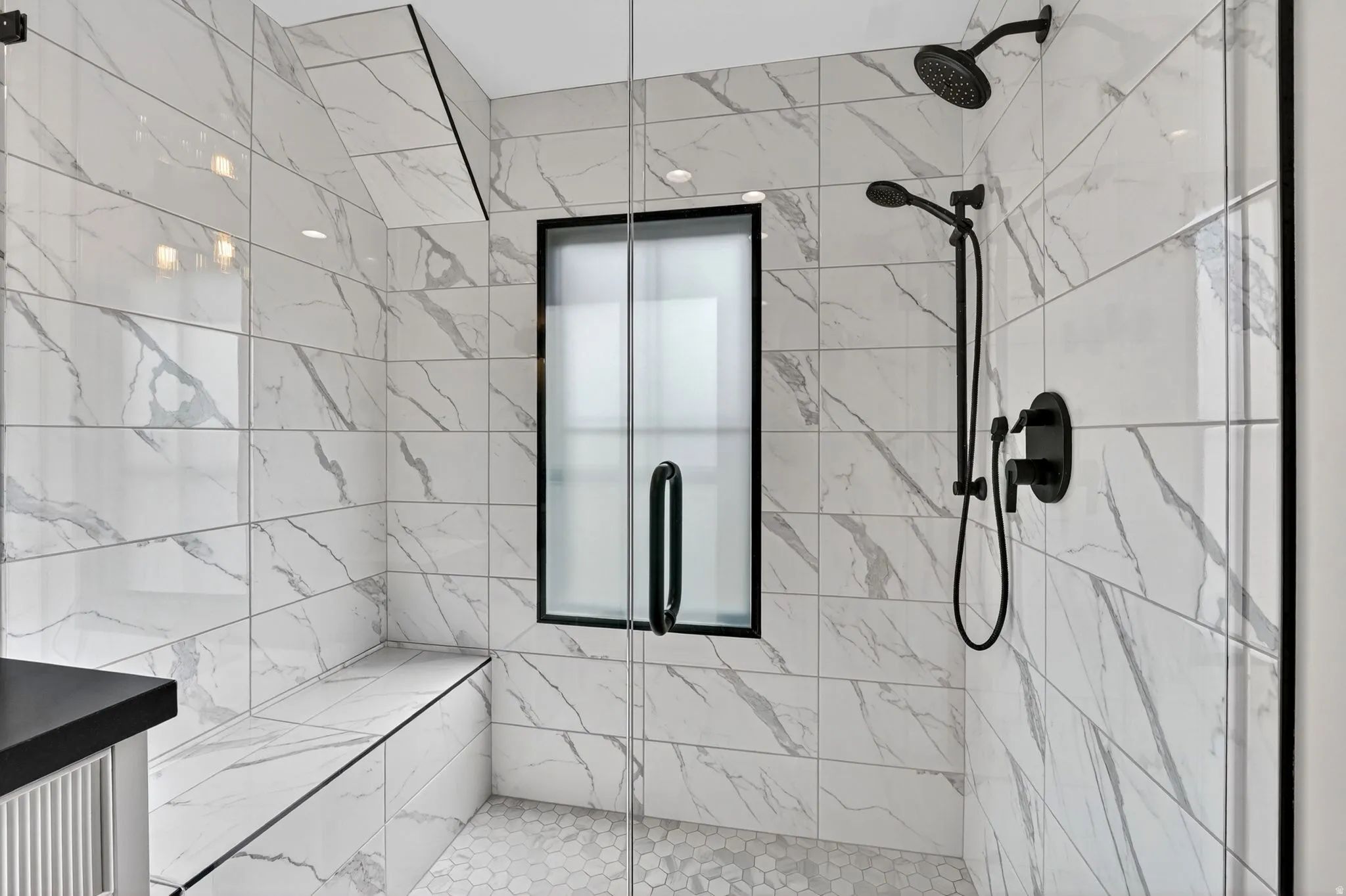 Full bath featuring a stall shower