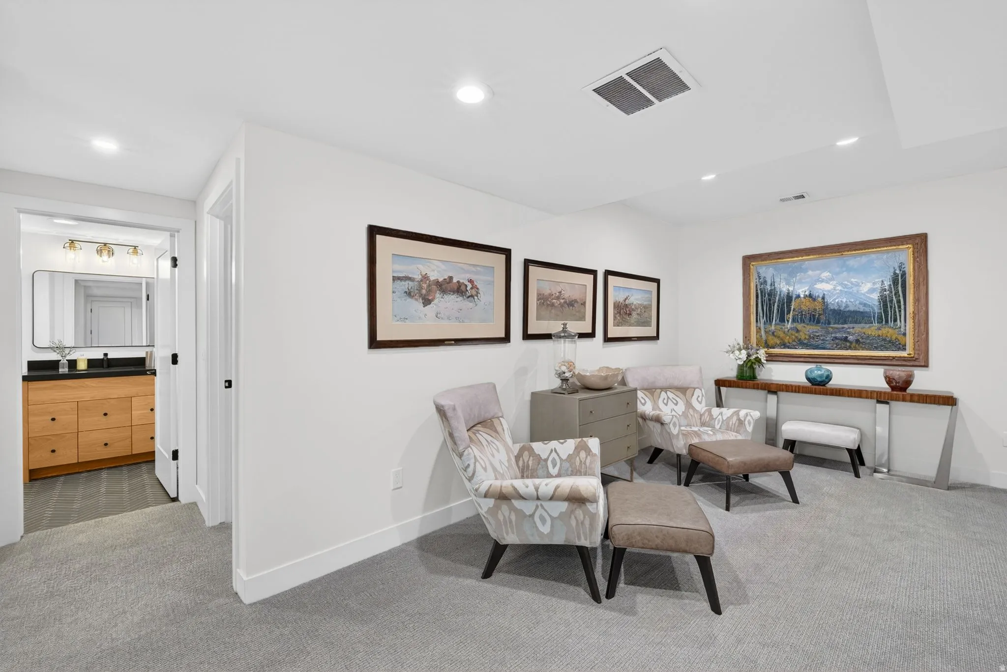 Sitting room featuring light carpet and recessed lighting