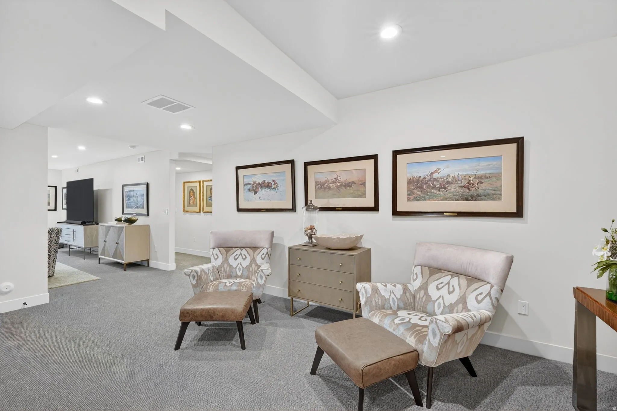 Sitting room featuring carpet and recessed lighting