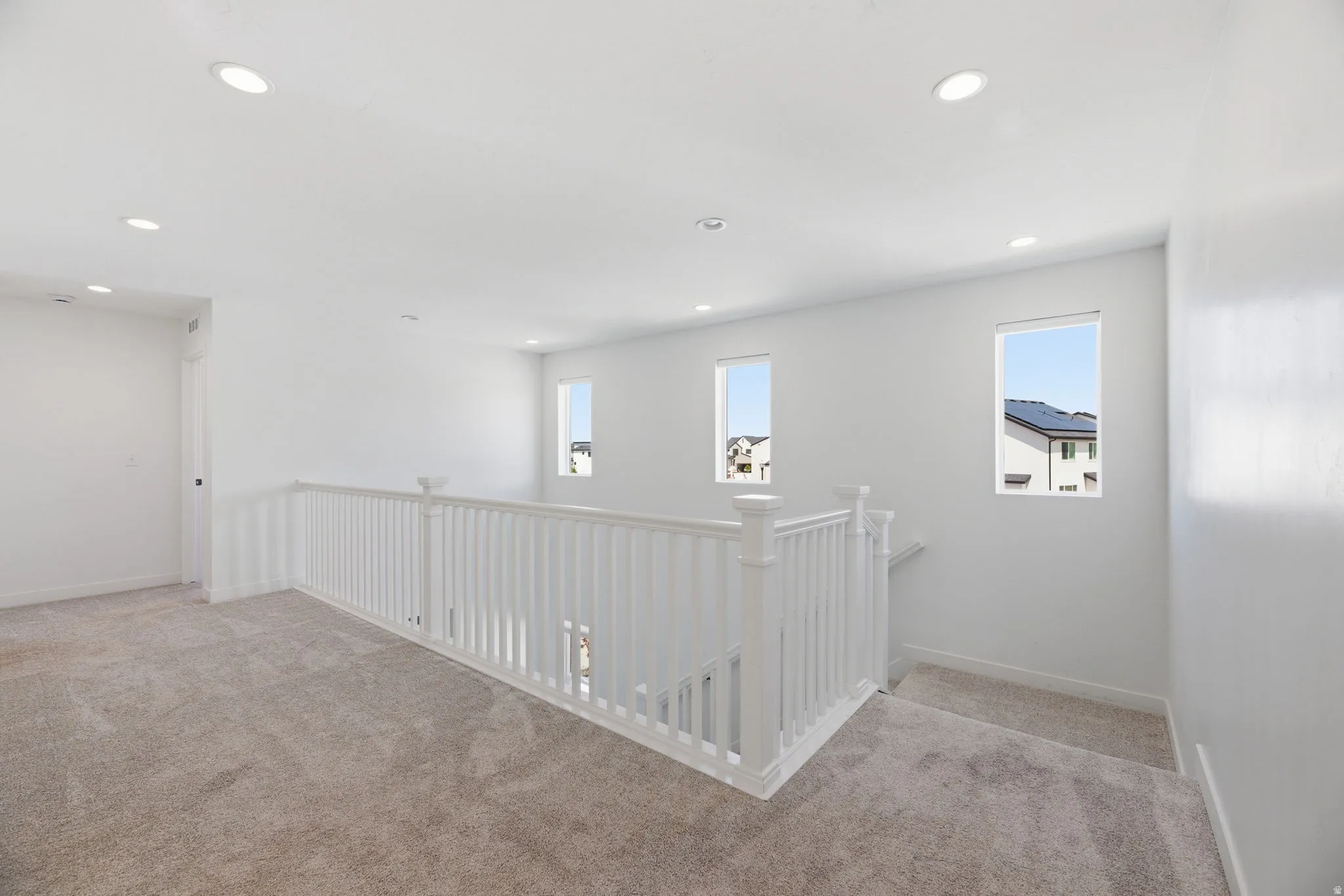 Stunning Staircase w/Railing and Opens to the Spacious Loft Living Area!
