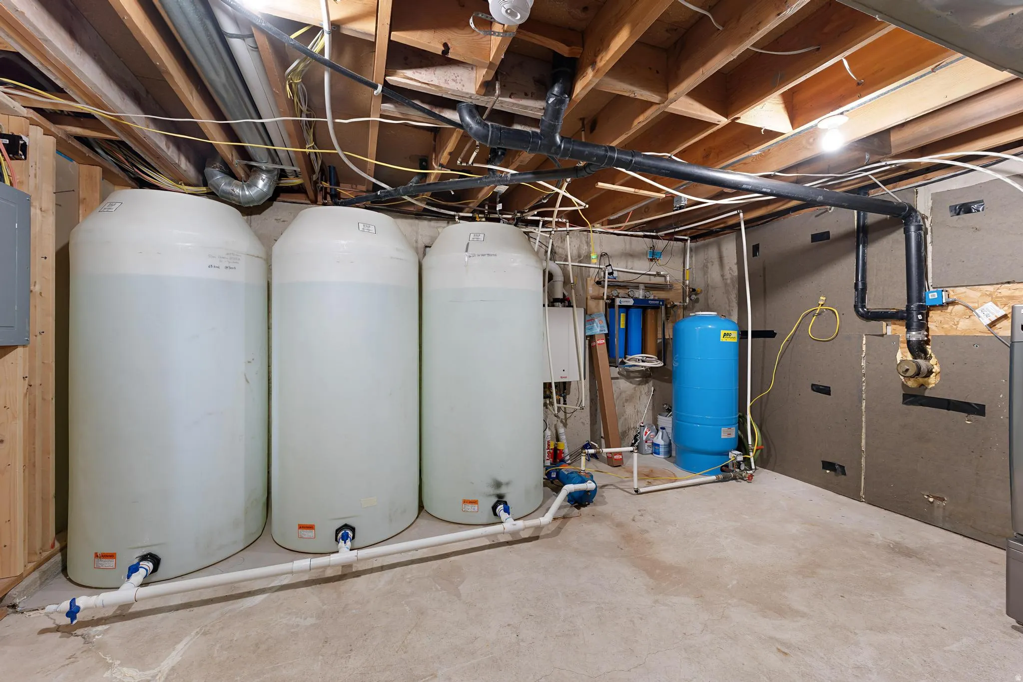 Utilities with water heater and electric panel