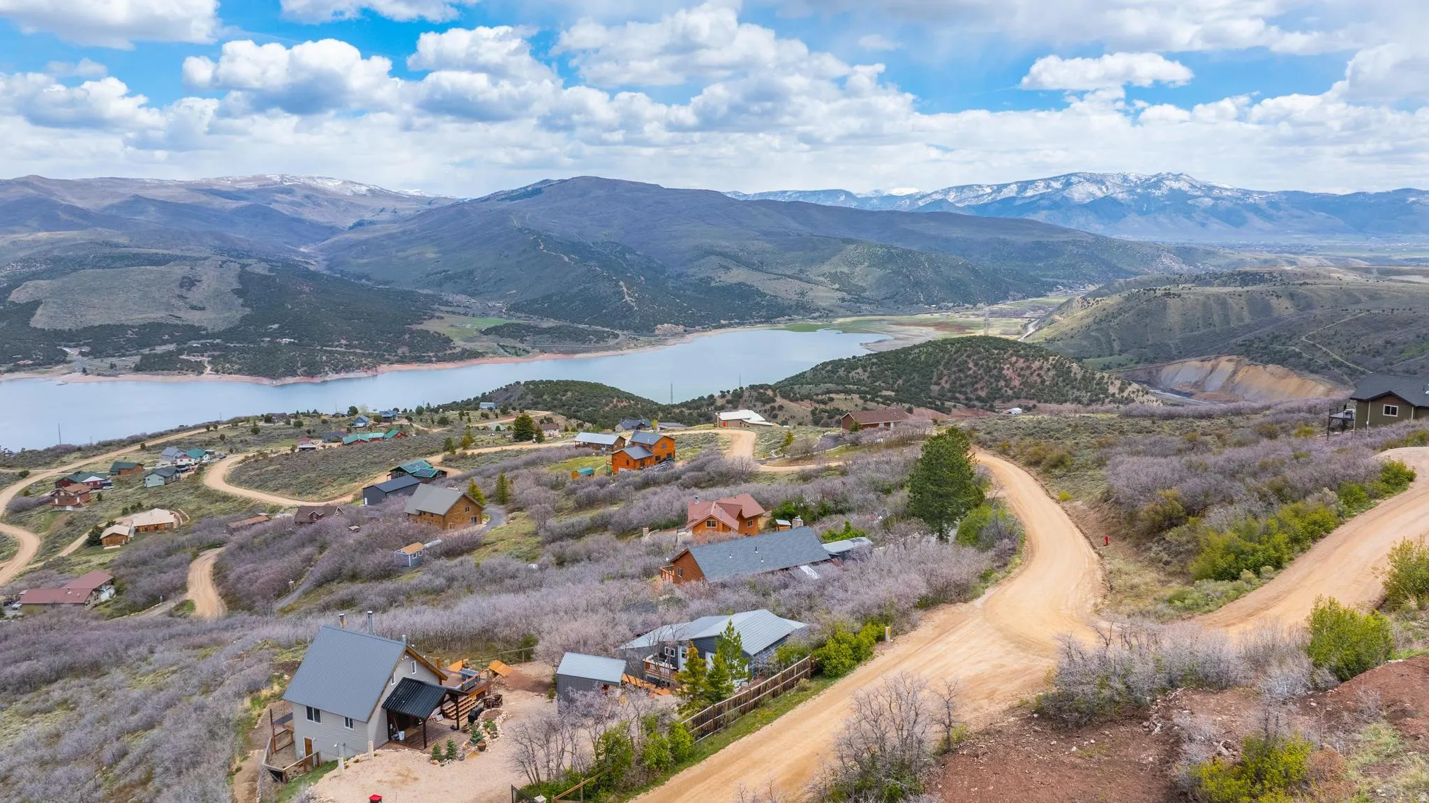 View of mountain backdrop featuring a large body of water