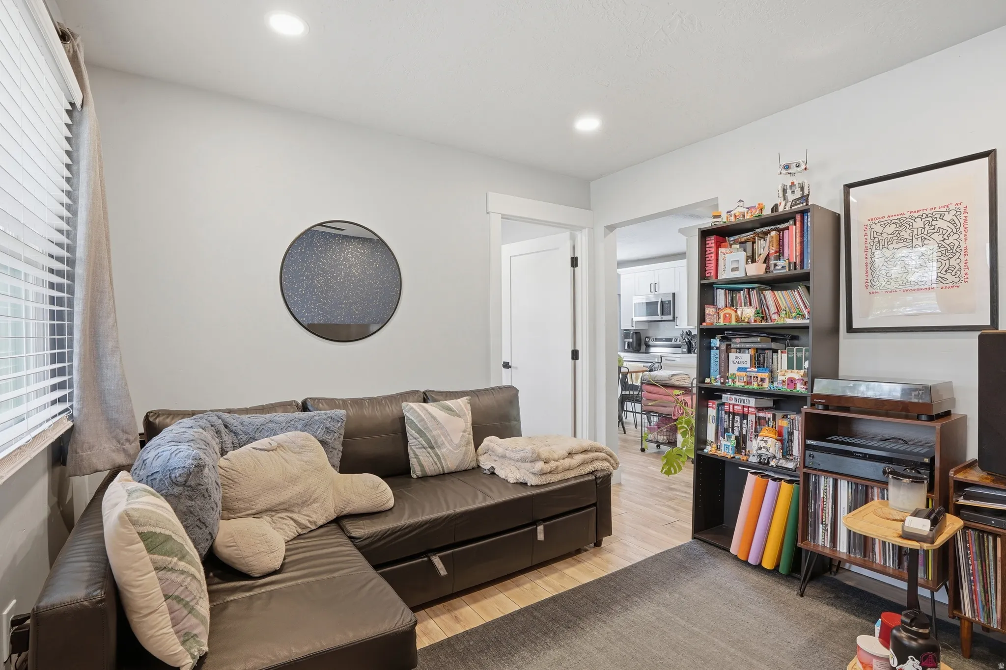 Unit #42 Living room featuring light wood-type flooring and recessed lighting