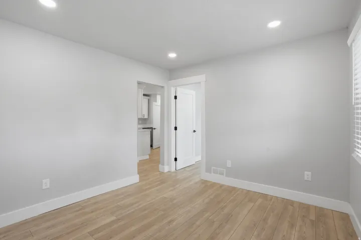 Unit #40 Spare room featuring light wood-type flooring and recessed lighting