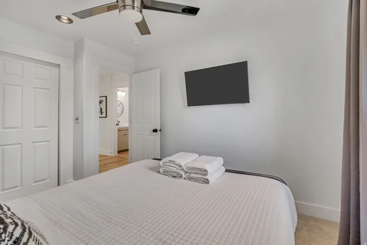 Bedroom featuring a ceiling fan, a closet, and recessed lighting