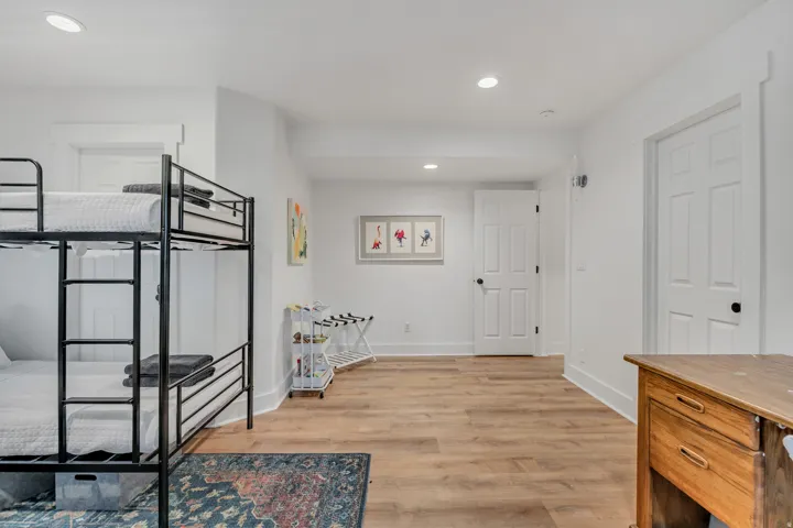 Corridor featuring recessed lighting and light wood-style floors