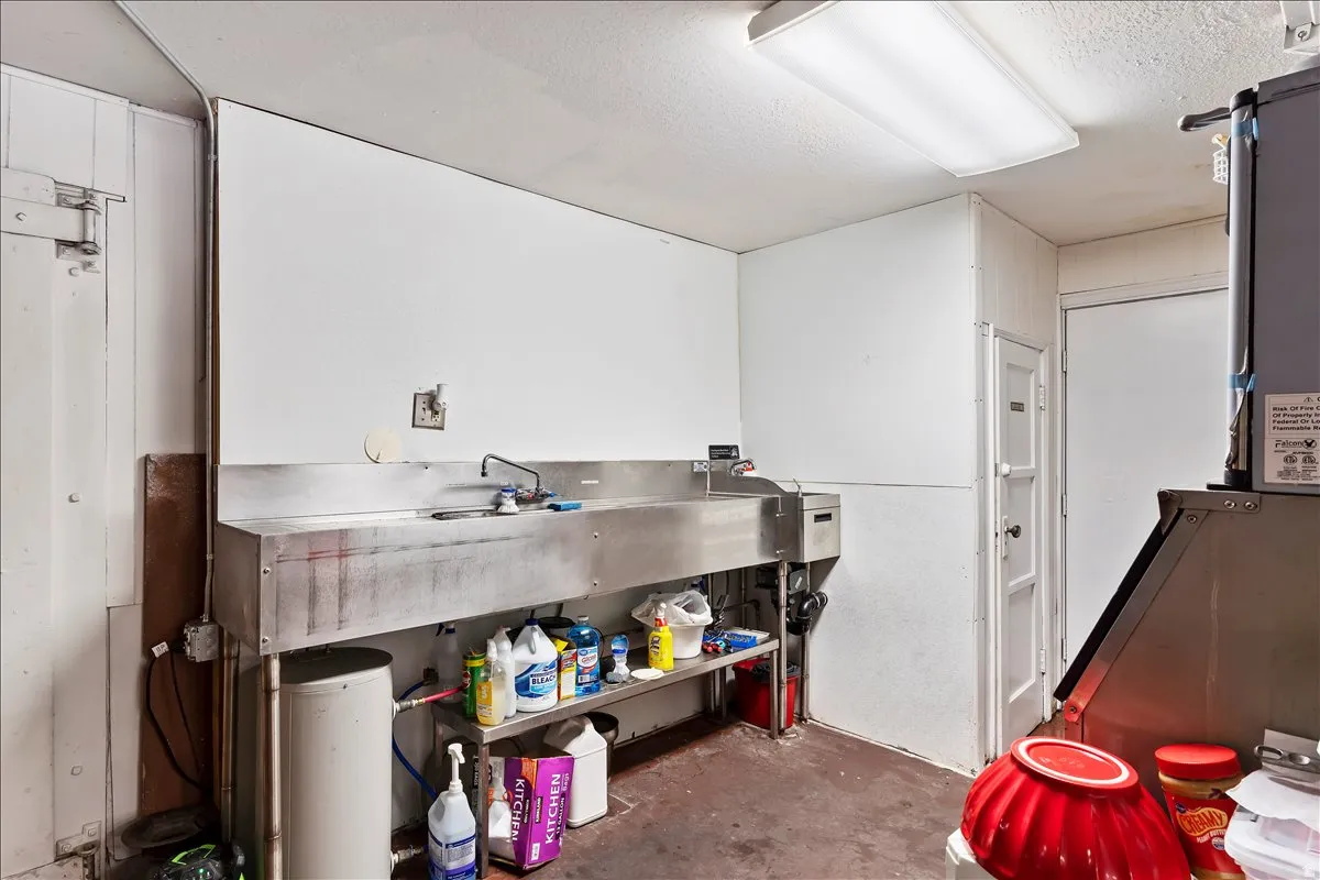 Miscellaneous room with a textured ceiling
