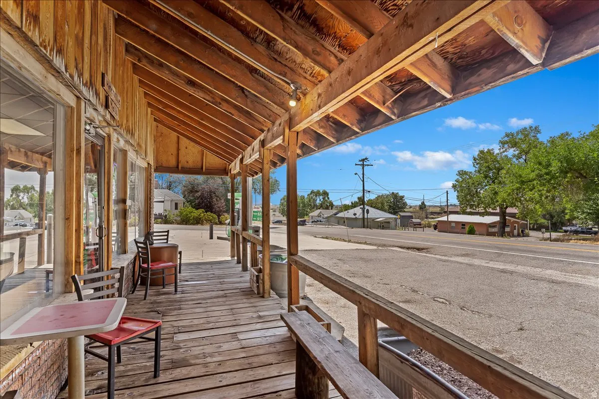 Wooden porch featuring a residential view