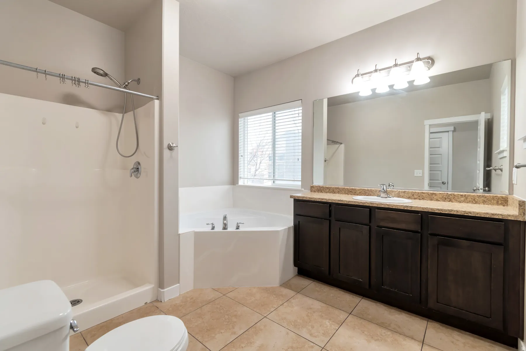Primary Bathroom with Double Vanity and Sept Tub/Shower