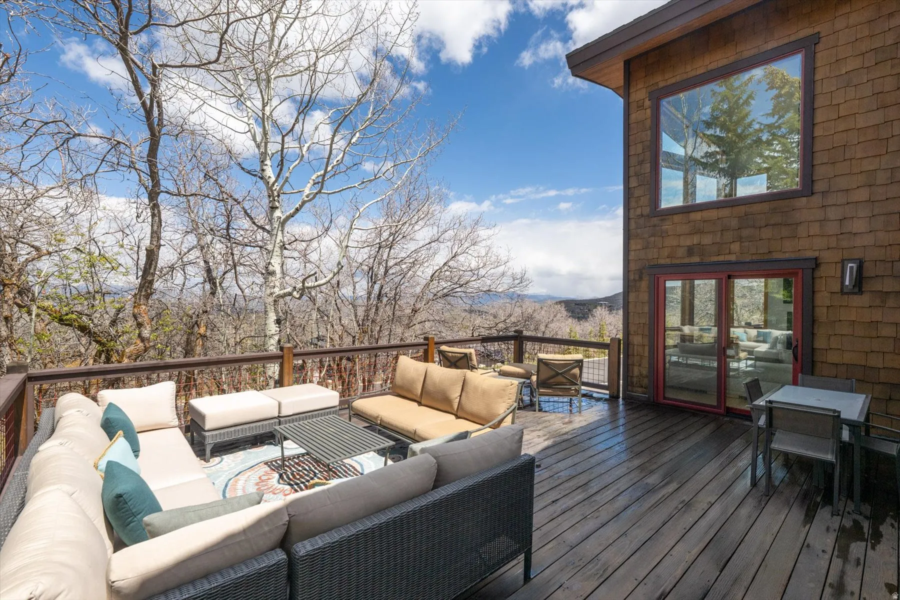 Wooden deck with an outdoor lounge area