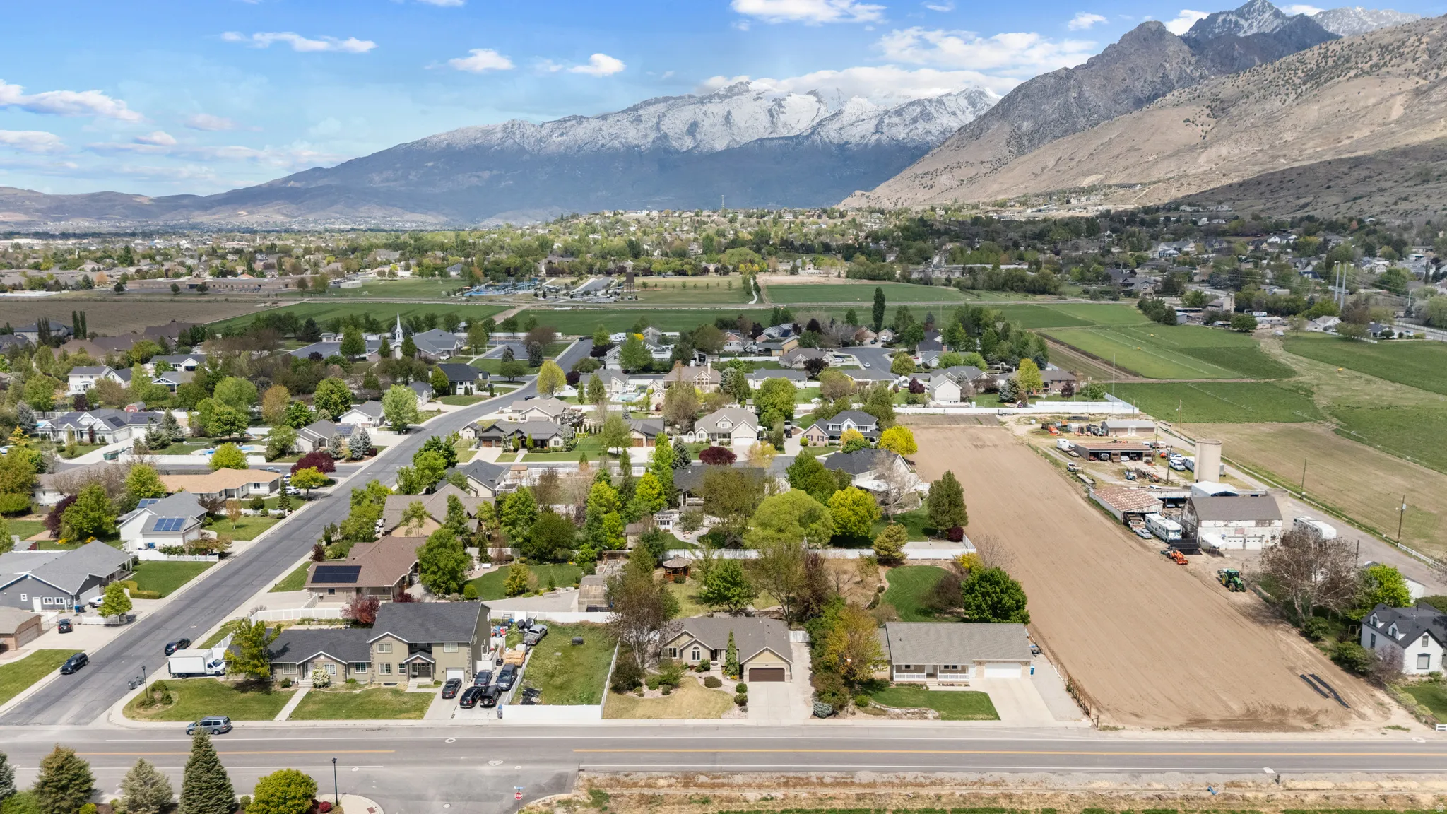 Aerial view of residential area with a mountain backdrop