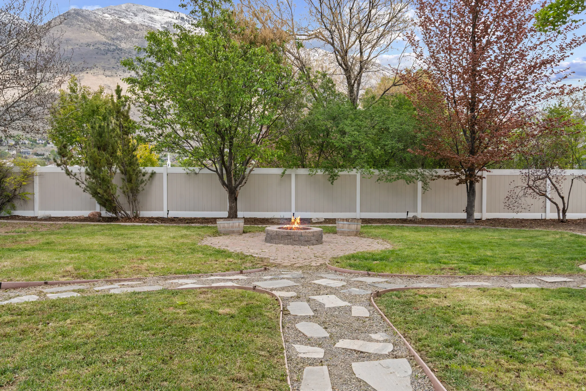 View of yard with a fire pit