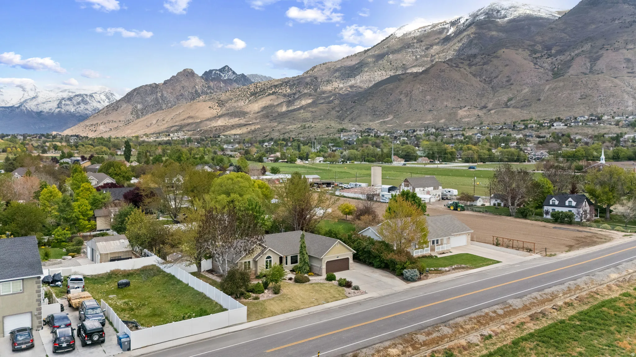 View of mountain background featuring nearby suburban area